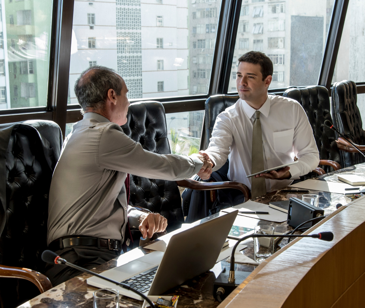 Spartan Capital funding specialists meeting with small business owners to discuss funding opportunities